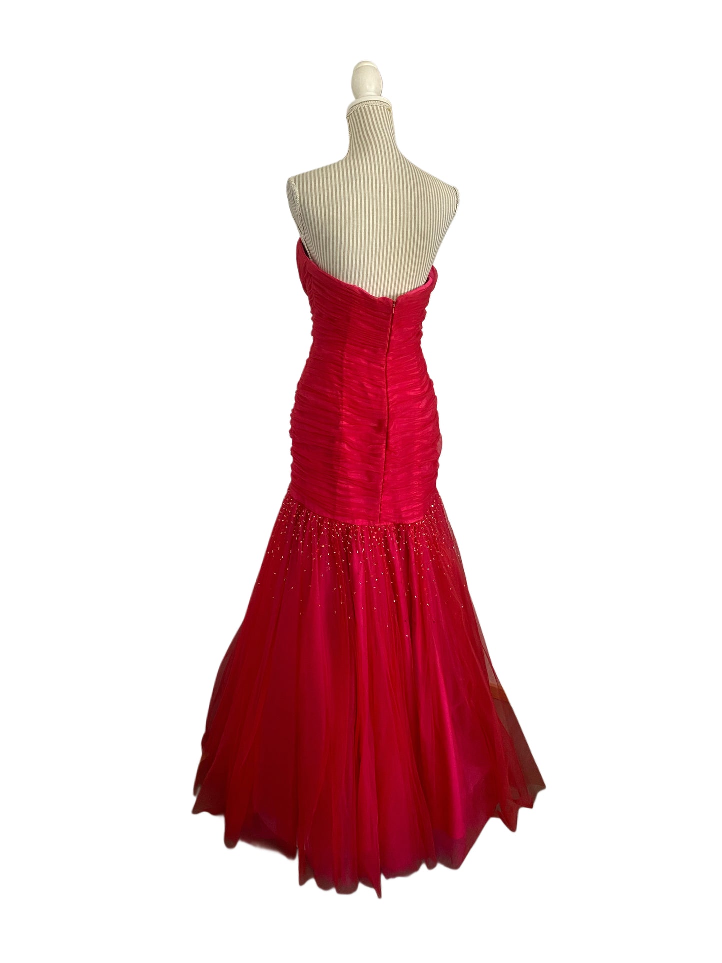 12 ans - rouge - faite assez petite